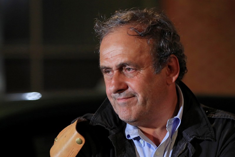 Former head of European football association UEFA Michel Platini leaves a judicial police station where he was detained for questioning over the awarding of the 2022 World Cup soccer tournament, in Nanterre
