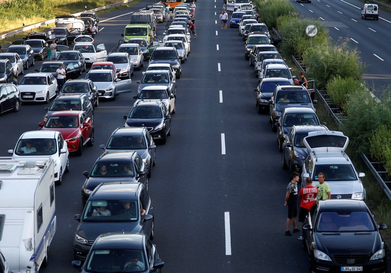 Cars stand on closed highway A9 at the crossing to highway A10 after a car accident near Mischendorf