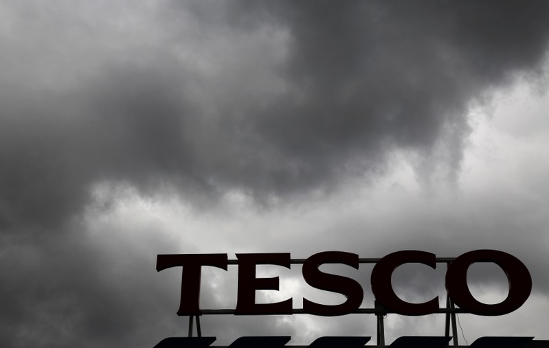 File photo of clouds over a Tesco Extra store in London