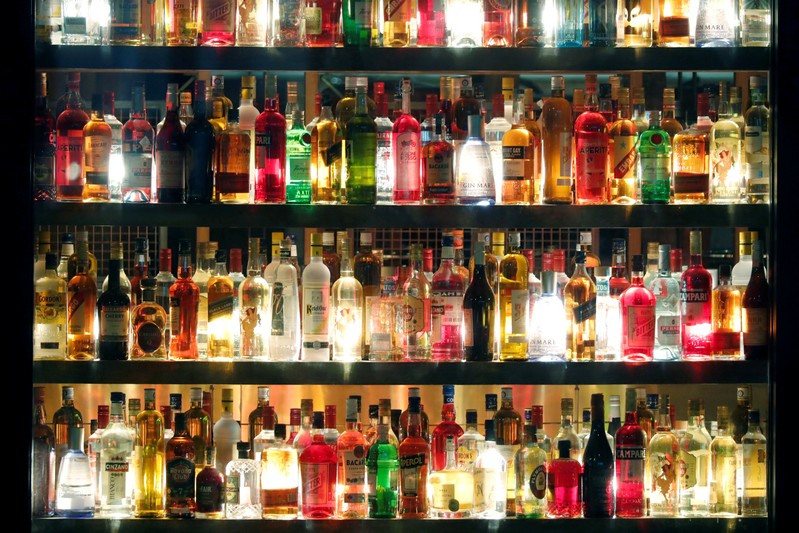 FILE PHOTO: Outside view of a restaurant's wall decorated with hundred of bottles in Paris