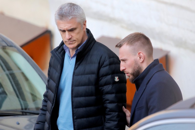 FILE PHOTO: U.S. investor and founder of the Baring Vostok private equity group Michael Calvey leaves a court after a hearing in Moscow, Russia