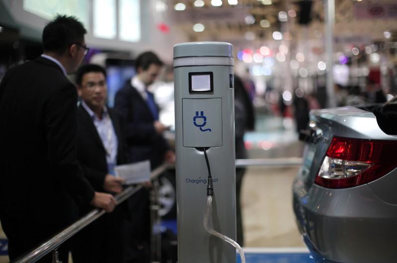 FILE PHOTO: A charging spot is seen at the stage of Chinese automaker BYD during the opening day of the Shanghai Auto Show