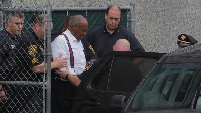 FILE PHOTO: Actor and comedian Bill Cosby leaves the Montgomery County Courthouse in handcuffs after sentencing in his sexual assault trial in Norristown