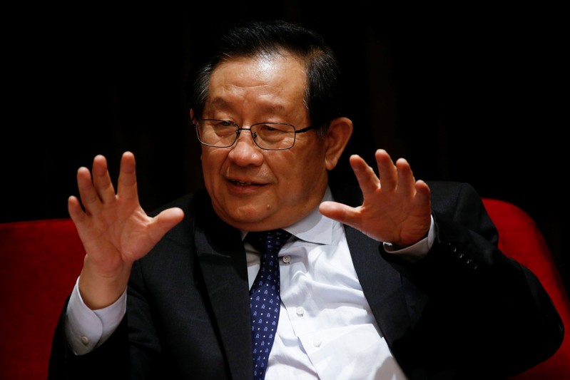 FILE PHOTO: Chinese Minister of Science and Technology Wan Gang attends International Forum on Electric Vehicle Pilot Cities and Industrial Development in Beijing
