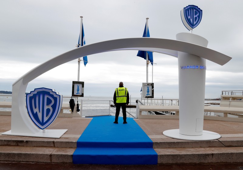 FILE PHOTO: The logo of Warner Bros entertainment company is seen during the MIPTV, the International Television Programs Market, in Cannes