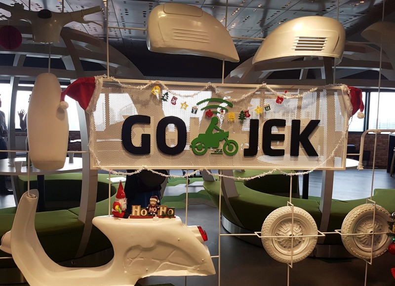A Go-Jek logo is pictured in their office in Singapore