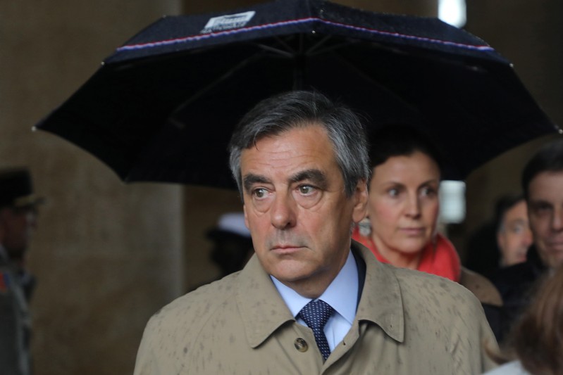 Former French Prime Minister Francois Fillon leaves after a national ceremony for late Lieutenant-Colonel Arnaud Beltrame at the Hotel des Invalides in Paris