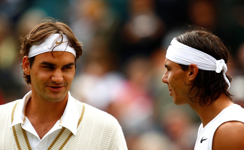 FILE PHOTO: Switzerland's Roger Federer and Spain's Rafael Nadal at the Men's Singles Final