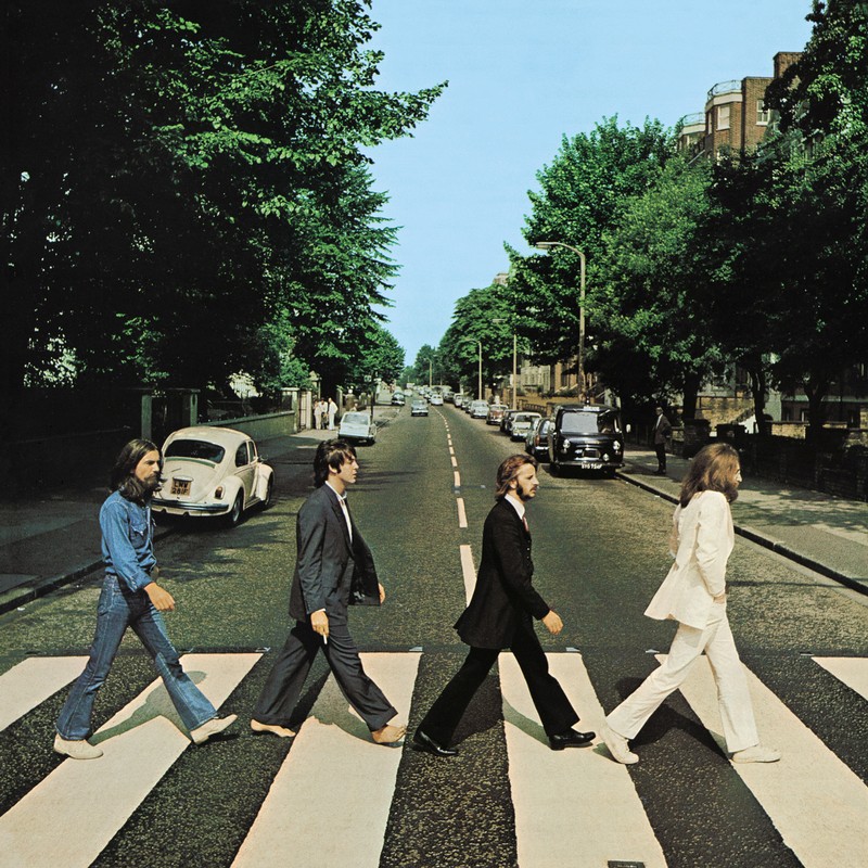 Members of the Beatles cross Abbey Road in London