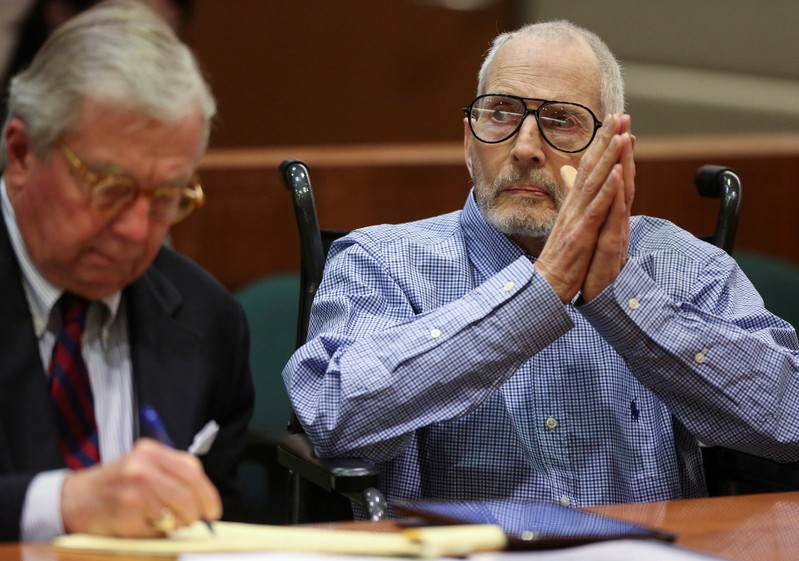 FILE PHOTO: New York real estate scion Durst appears in the Los Angeles Superior Court Airport Branch with his defense lawyer DeGuerin for a pre-trial motions hearing in Los Angeles