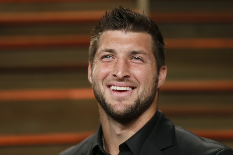 Tim Tebow arrives at the 2014 Vanity Fair Oscars Party in West Hollywood California