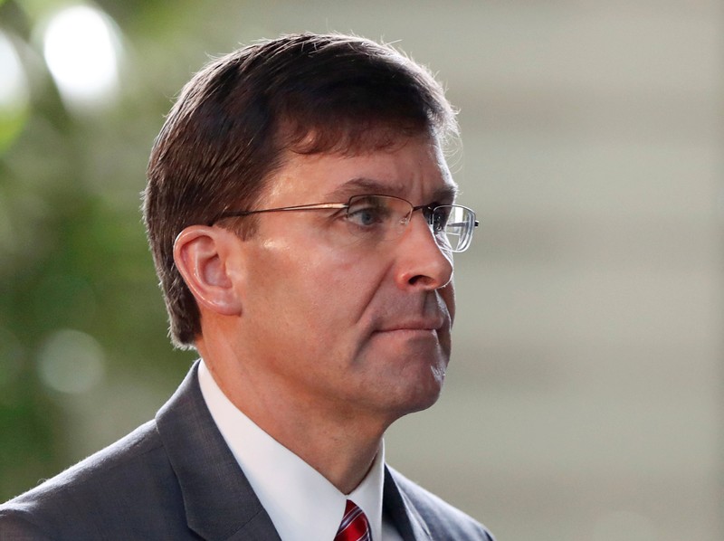 FILE PHOTO: U.S. Secretary of Defence Mark Esper arrives for a meeting with Japanese Prime Minister Shinzo Abe at Abe's official residence in Tokyo