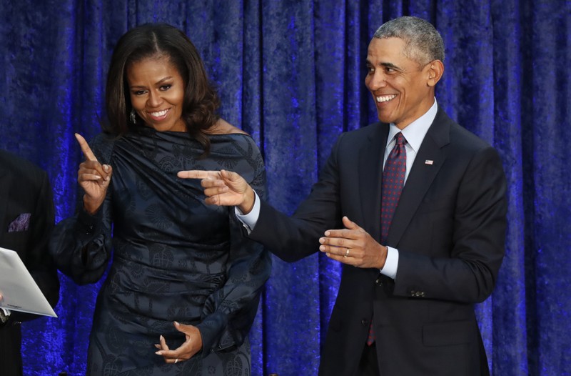 FILE PHOTO: Former U.S. President Barack Obama and former first lady Michelle Obama attend their portrait unveiling ceremony in Washington