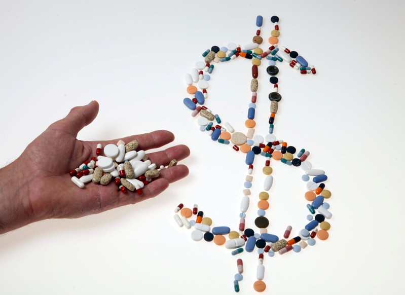 FILE PHOTO: Pharmaceutical tablets and capsules are arranged on a table in this picture illustration taken in Slovenia