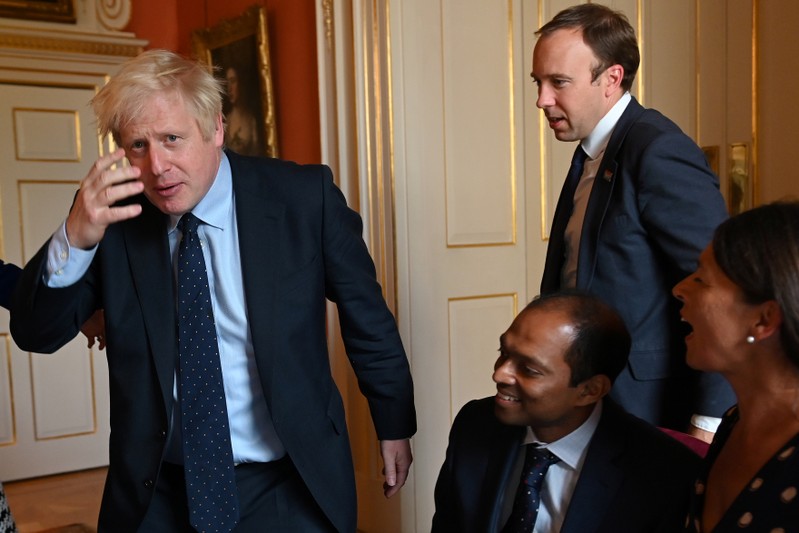 Britain's Prime Minister Boris Johnson meets with NHS workers inside 10 Downing Street in London