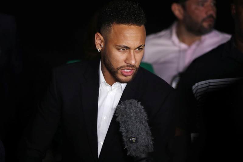 FILE PHOTO: Brazilian soccer player Neymar leaves a police station in Sao Paulo