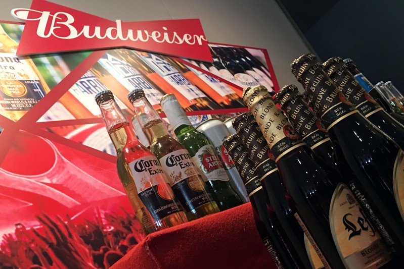 Portfolio beer brands of Budweiser Brewing Company APAC Ltd are displayed during a news conference on the company's IPO in Hong Kong