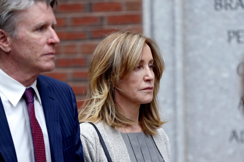Actror Felicity Huffman leaves the federal courthouse in Boston
