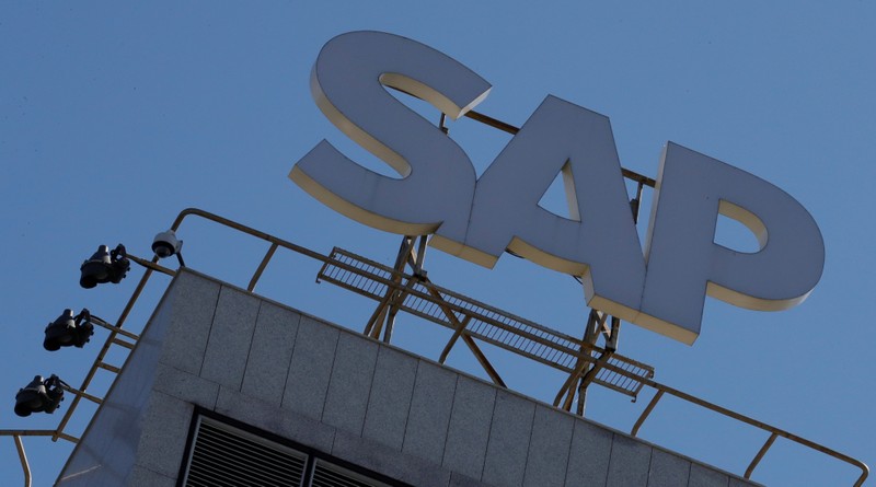 FILE PHOTO: A view shows a sign with the logo of SAP software company on the roof of an office building in Moscow