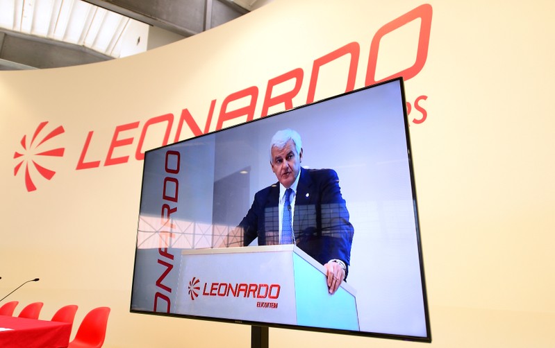 FILE PHOTO: Leonardo CEO Alessandro Profumo seen on a screen at the Italian defence group's Milan headquartersergiate