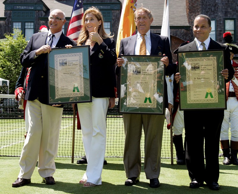 FILE PHOTO: Members of 2009 International Tennis Hall of Fame inductees Gimeno, Seles, Dell and Johnson pose with their plaques in Newport