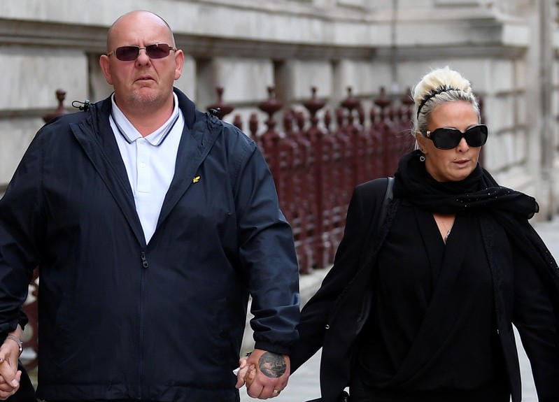Tim Dunn and Charlotte Charles, parents of Harry Dunn, leave the Foreign and Commonwealth office in London