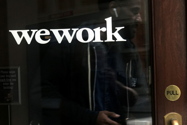 FILE PHOTO: A man walks out of a WeWork space in the Manhattan borough of New York City