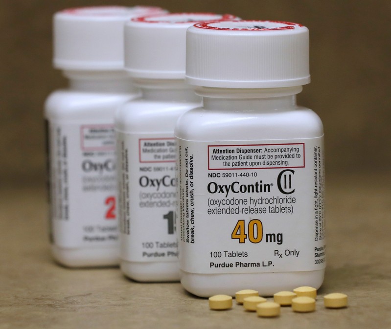 FILE PHOTO: Bottles of prescription painkiller OxyContin, 40mg, 20mg and 15mg pills, made by Purdue Pharma L.D. sit on a counter at a local pharmacy in Provo