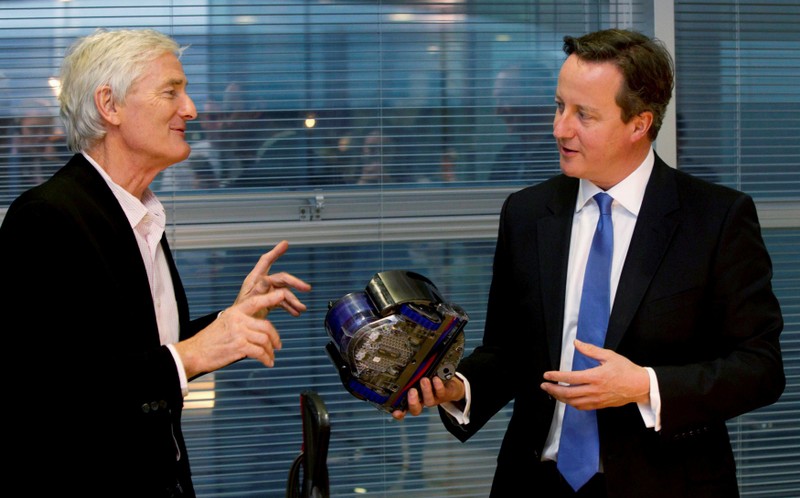 FILE PHOTO: Britain's Prime Minister Cameron views vacuum design products with Dyson at the Dyson headquarters in Malmesbury , south west England