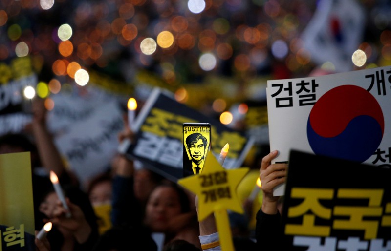 People take part in a protest to support Justice Minister Cho Kuk and to demand a prosecution reform in front of Seoul Central District Prosecutors' Office in Seoul