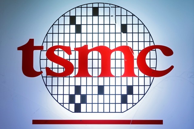 The logo of Taiwan Semiconductor Manufacturing Company (TSMC) is seen during an investors' conference in Taipei