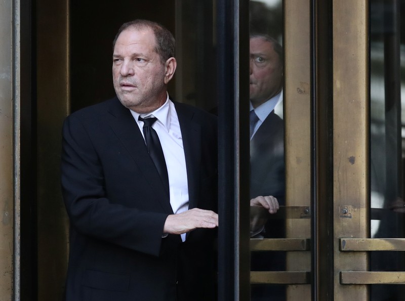 FILE PHOTO: Film producer Harvey Weinstein leaves New York Supreme Court after his arraignment in his sexual assault case in New York