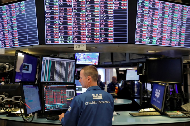 A trader works on the trading floor at the New York Stock Exchange (NYSE) in New York City
