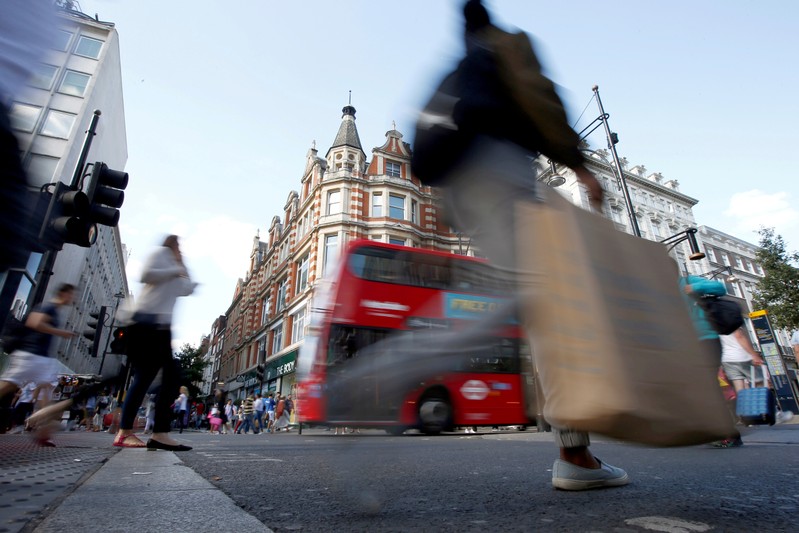 sFile photo of shoppers crossing the road in Oxford Street, in London
