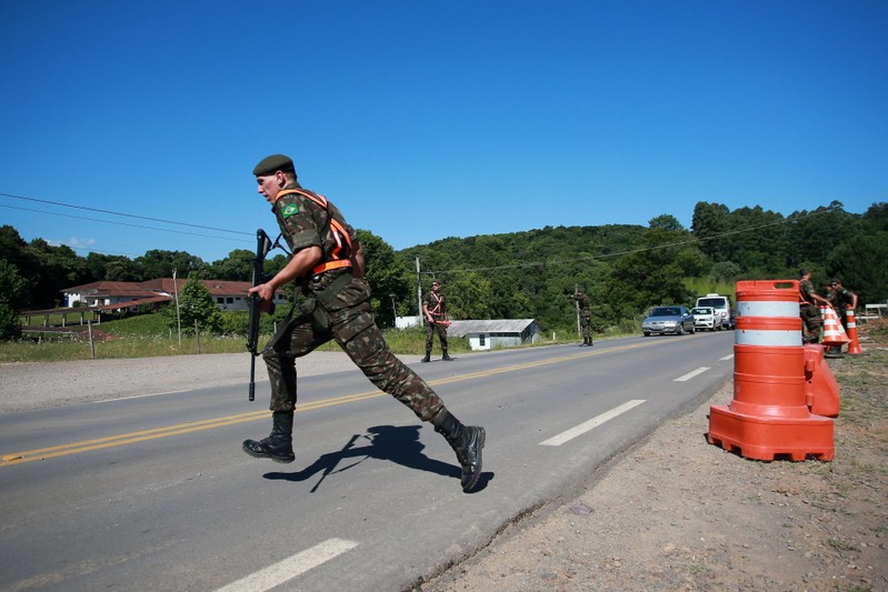 Soldiers patrol near Spa de Vinho hotel, which will host next Mercosur summit, in Bento Goncalves