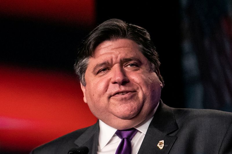 FILE PHOTO: lllinois Governor J.B. Pritzker delivers remarks at the North America's Building Trades Unions (NABTU) 2019 legislative conference in Washington