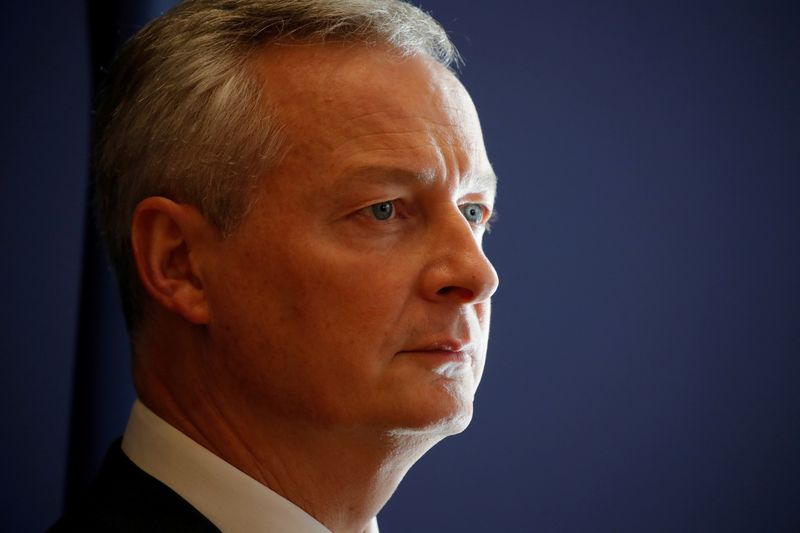 FILE PHOTO: French Finance Minister Bruno Le Maire attends a news conference at the Finance Ministry in Paris