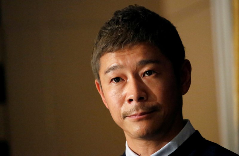 FILE PHOTO: Japanese billionaire Yusaku Maezawa, founder and chief executive of online fashion retailer Zozo, who has been chosen as the first private passenger by SpaceX, attends a news conference at the Foreign Correspondents' Club of Japan in Tokyo