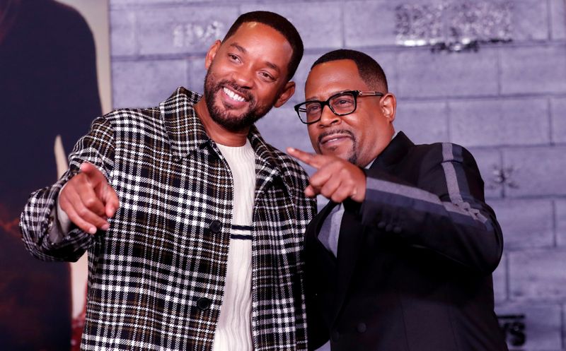 FILE PHOTO: Cast members Smith and Lawrence pose at the premiere of
