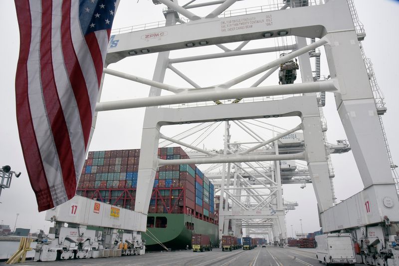 Shipping containers sit at the Port of Long Beach in Long Beach, California