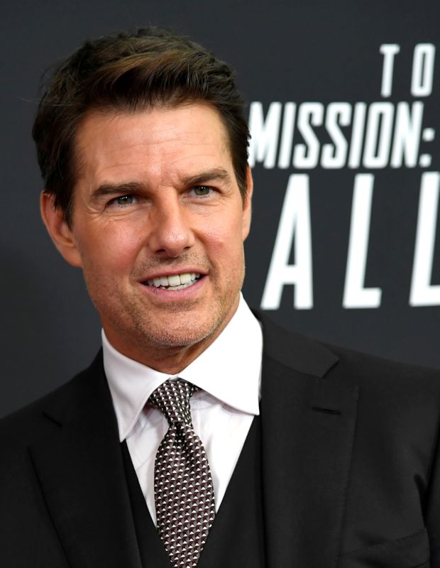 FILE PHOTO: Actor Tom Cruise arrives for Mission:Impossible film premiere in Washington