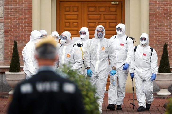 Members of the Military Emergency Unit (UME) leave an elderly home after carrying out disinfection procedures during the coronavirus disease (COVID-19) outbreak in Madrid