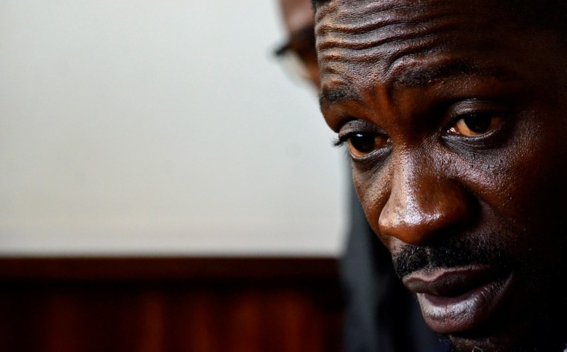 Ugandan musician turned politician, Robert Kyagulanyi also known as Bobi Wine sits in the dock at the Buganda Road Chief Magistrate Court, in Kampala