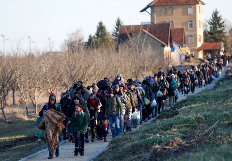 FILE PHOTO: Migrants protest in Serbia's north to demand a passage to the EU