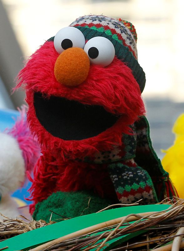 FILE PHOTO: An Elmo muppet is seen on the Sesame Street float during the 86th Macy's Thanksgiving day parade in New York
