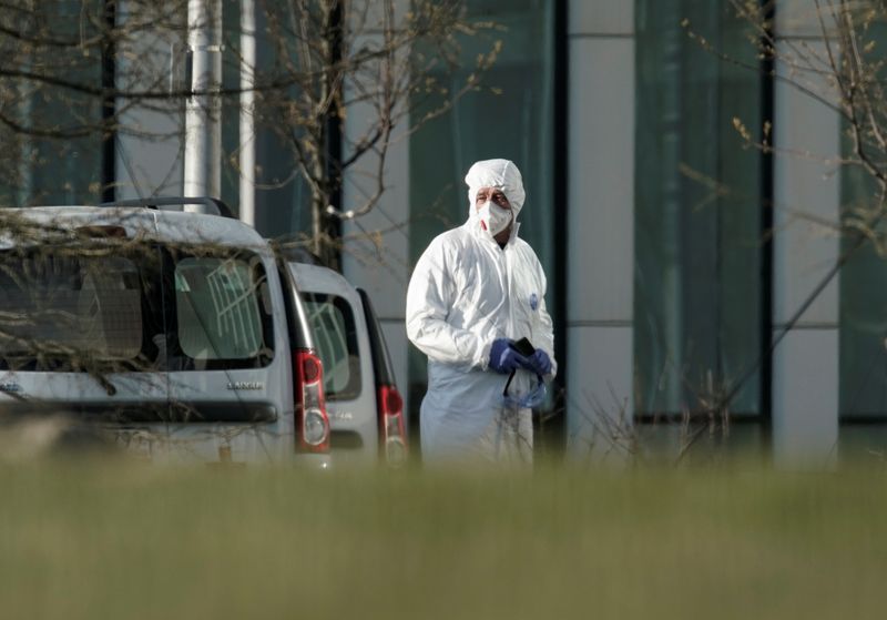 A medical specialist stands outside a hospital for patients infected with the coronavirus disease on the outskirts of Moscow