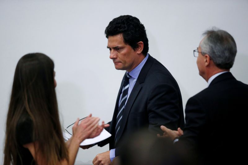 Brazil's Justice Minister Sergio Moro leaves a news conference in Brasilia