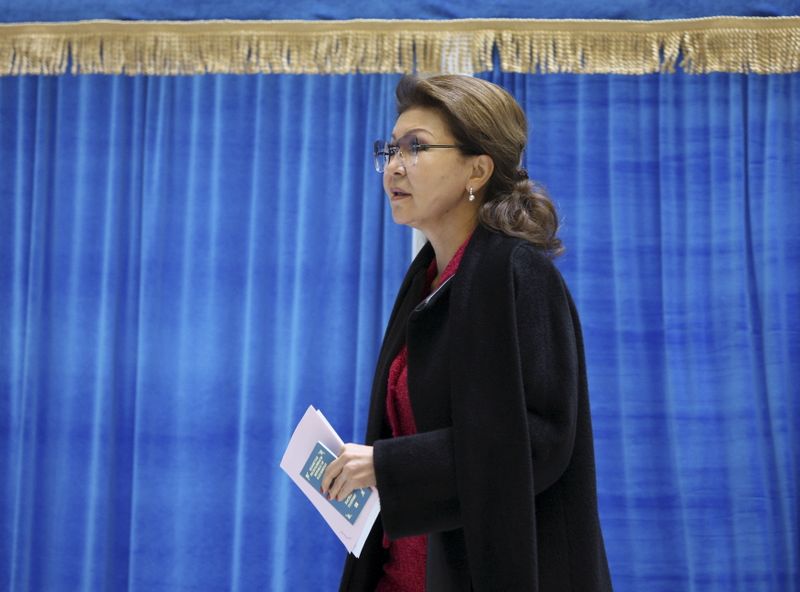 Dariga Nazarbayeva, Kazakhstan's deputy prime minister and daughter of President Nursultan Nazarbayev, visits a polling station during a snap parliamentary election in Astana, Kazakhstan