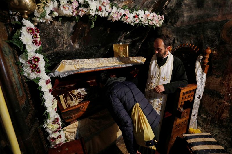 Pilgrims walk to the medieval monastery of Ostrog and challenge coronavirus restrictions, in Niksic