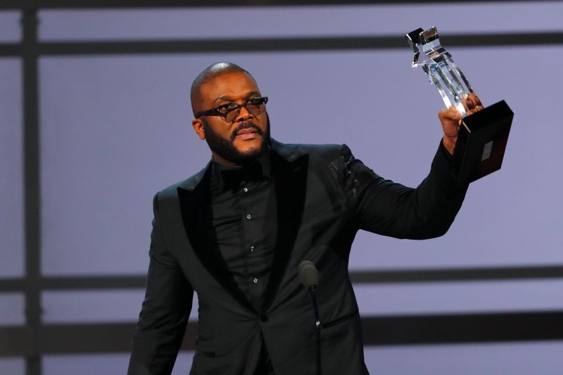 FILE PHOTO: Movie mogul Tyler Perry accepts the Ultimate Icon award at the 2019 BET Awards in Los Angeles, California